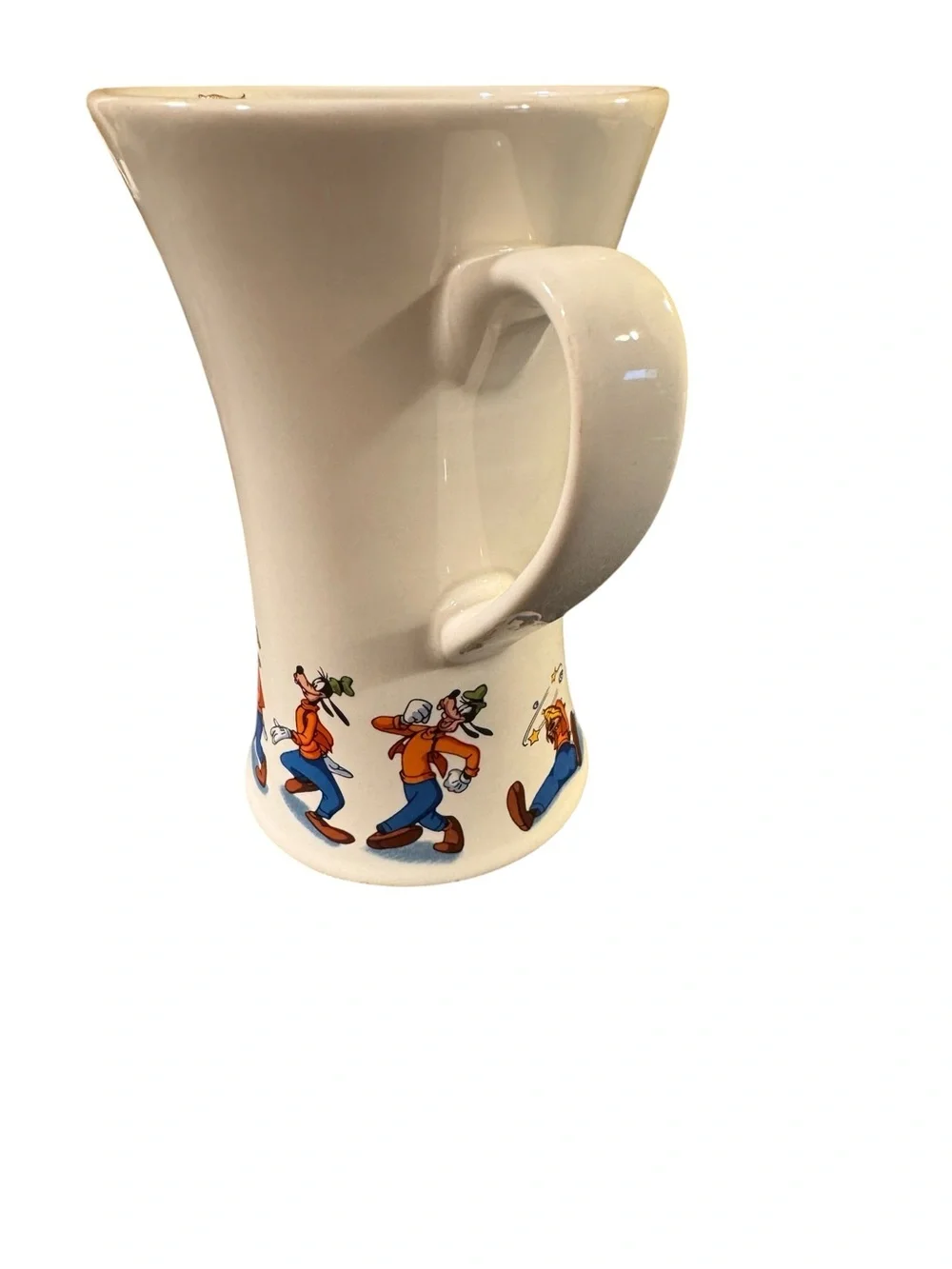 Vintage Disney store Goofy slipping on a banana peel.